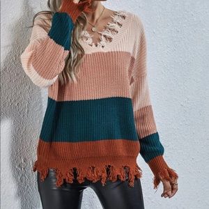 New distressed color block sweater